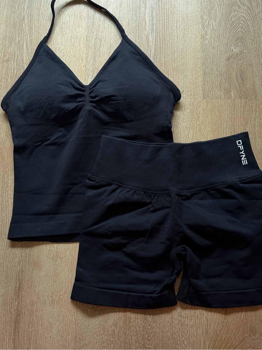 DFyne black impact sports bra and shorts set